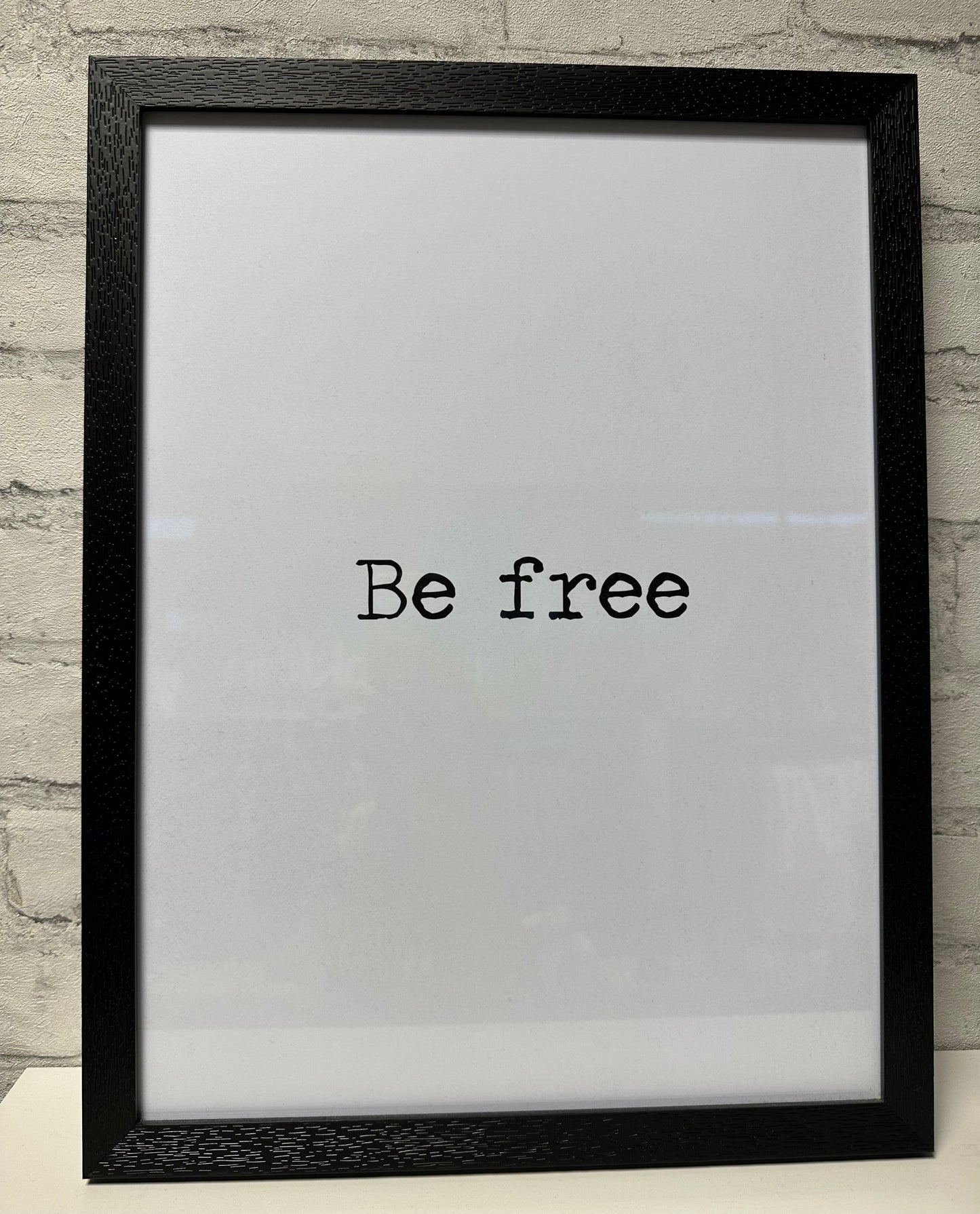 Bild gerahmt "Be free"